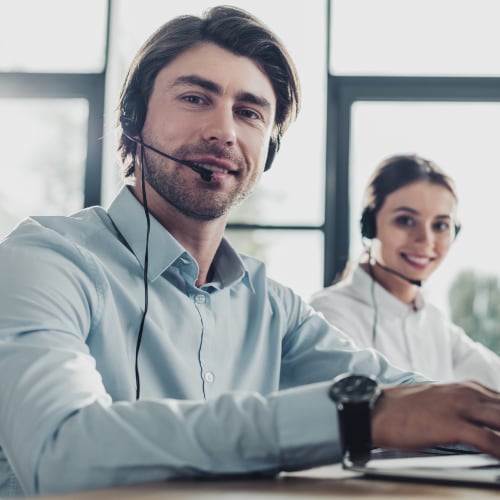 man on phone offering microsoft technology expertise