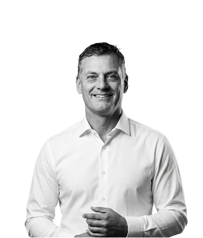 IncWorx CEO, Gary, smiling in white collared shirt.