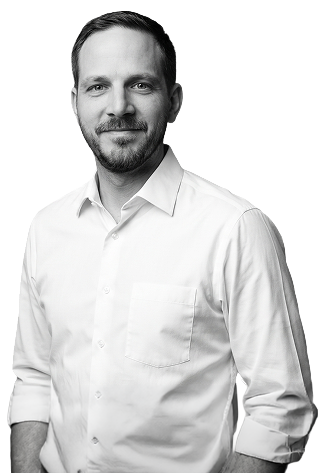 Incworx consultant, Tim Davis, soft smiling and pictured in a white collared shirt